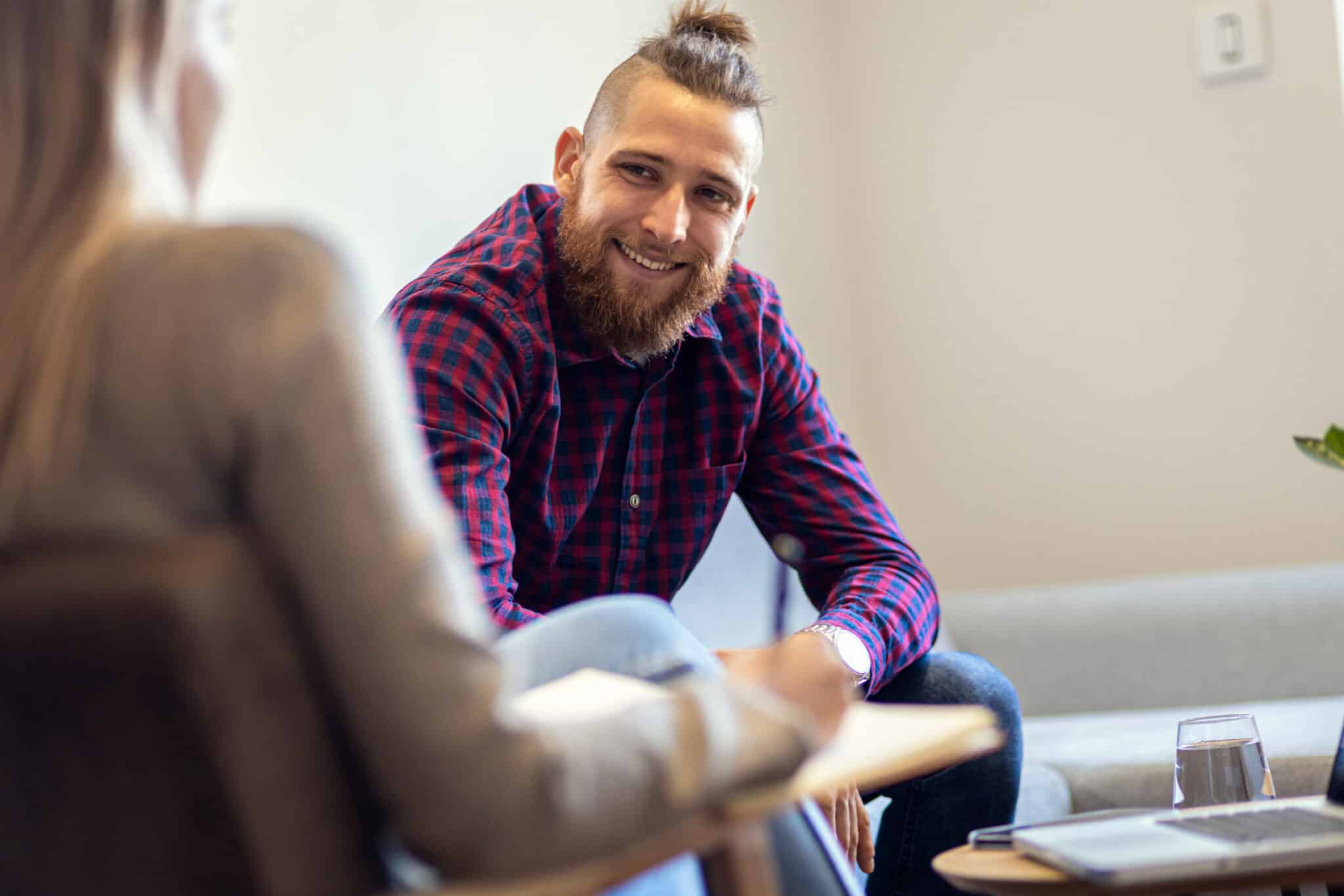 young man in counseling session for alcohol addiction treatment program near you